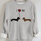 Two dog print hoodies