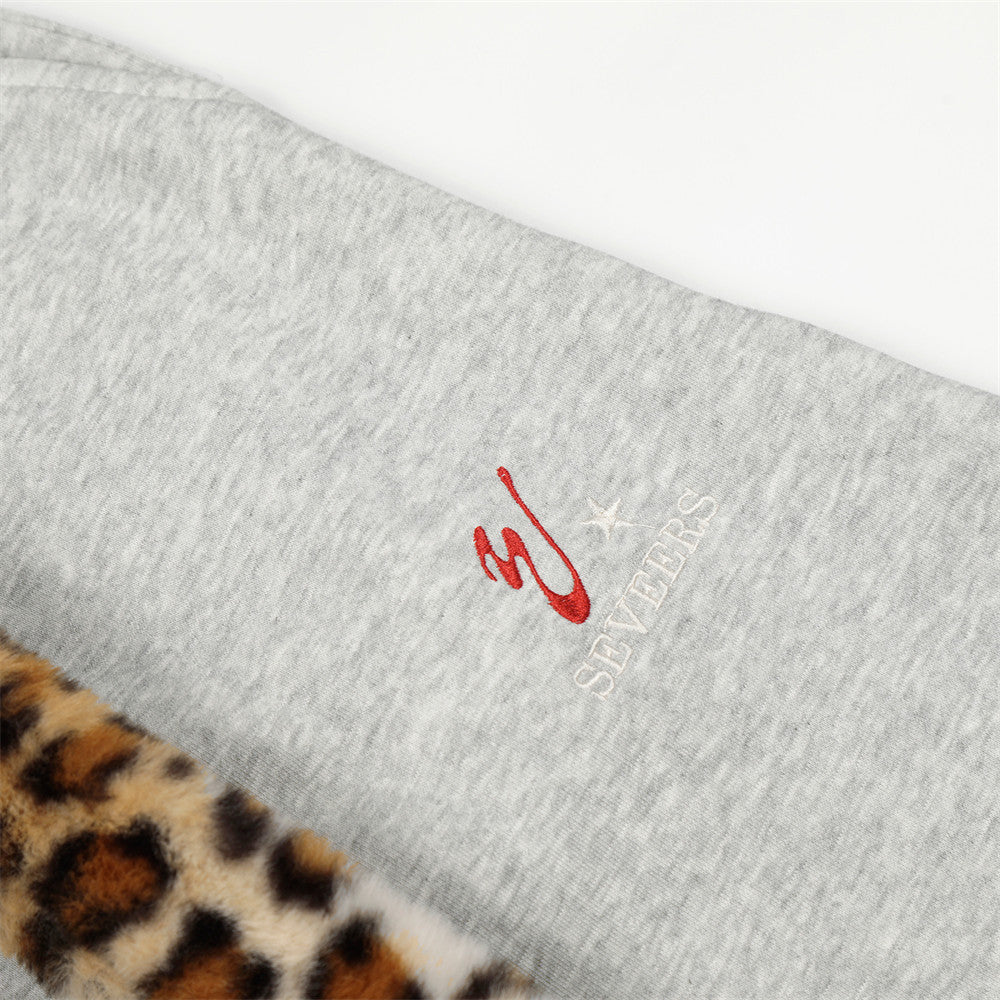 Bent knife and velvet sweatpants