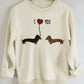Two dog print hoodies