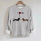 Two dog print hoodies